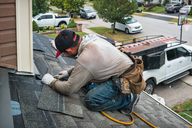 Professional Roofing technician working in Glenville, CT